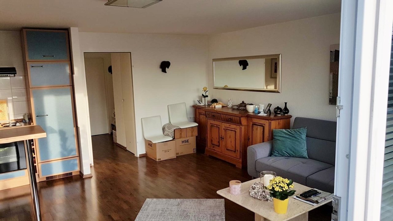 Wohnzimmer mit offener Küche Wohnzimmer mit offener Küche