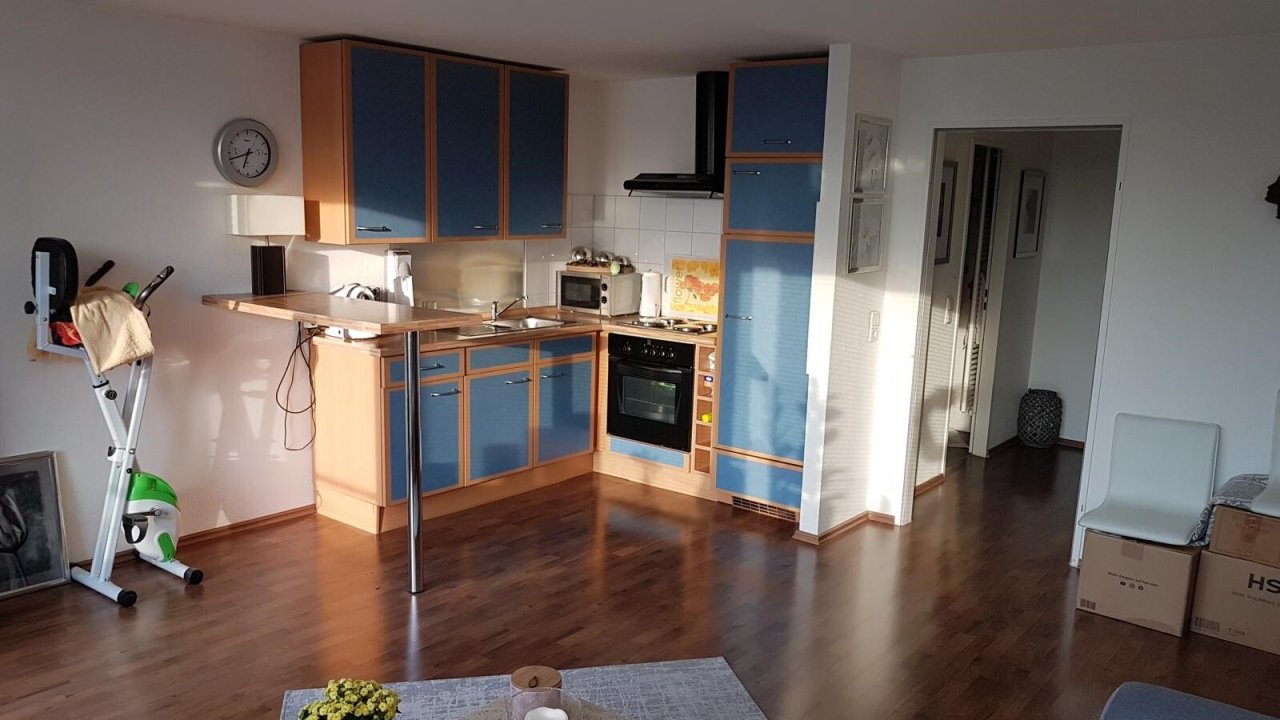 Wohnzimmer mit offener Küche Wohnzimmer mit offener Küche